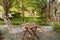 Sleeping corner with three iron chairs in a tropical garden in N