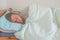 Sleeping guy at home. Relaxed man. Promote prevention and management of sleep disorders