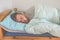 Sleeping guy at home. Relaxed man. Promote prevention and management of sleep disorders