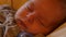 Sleeping newborn baby with camera motion