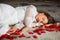 Sleeping with rose petals