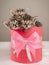 Sleeping tabby kittens in a gift box with a bow vertical picture