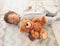 Sleeping, teddy bear and nap with baby in bedroom for tired, development and innocence. Dreaming, relax and comfortable