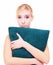 Sleepy blond girl with green pillow isolated over white