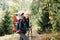 Sleepy tired child walking with father in backpack outdoors