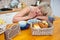 Sleepy woman yawn at breakfast table