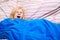 Sleepy woman yawn in a duvet