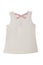 Sleeveless shirt isolated. Beige child girl shirt or t-shirt with pink ribbons on the back isolated on a white background. Kids