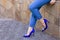 slender legs in blue breeches and heels
