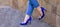 slender legs in blue breeches and heels