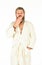 Slept well. Rest at home. Feeling good. Hipster with long hair and beard in bathrobe white background. Morning concept