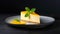A slice of classic cheesecake with a vibrant mango glaze fresh mint on top, against a minimalist black background