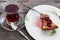 Slice of delicious cheesecake with Turkish tea