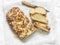 Slice of fresh homemade challah on a light background, top view