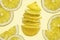 Slice fresh juicy lemon bright saturated yellow fruit close-up white soft background