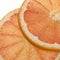 SLICE OF GRAPEFRUIT citrus grandis AGAINST WHITE BACKGROUND