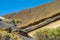 Slice of a hill on Teide volcano. Colorful volcanic soil. Desert ground