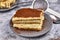 Slice of homemade Tiramisu cream cake dessert