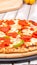 Slice of hot pizza large cheese lunch or dinner crust seafood meat topping sauce. with bell pepper vegetables delicious tasty fast