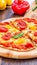 Slice of hot pizza large cheese lunch or dinner crust seafood meat topping sauce. with bell pepper vegetables delicious tasty fast