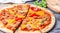 Slice of hot pizza large cheese lunch or dinner crust seafood meat topping sauce. with bell pepper vegetables delicious tasty fast