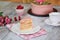 Slice of layered creamy fruit cake. Raspberry layer cake