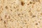 Slice of multi-seed wholegrain bread detail