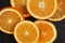 Slice oranges on a dark background top view close-up. citrus diet healthy natural fruits. organic food