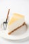 Slice Of Plain New York Cheesecake On Plate