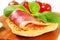 Slice of prosciutto on crispy bread