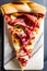 a slice of prosciutto italian pizza on a marble surface generated by ai