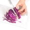 Slice red cabbage on white plate block isolate on white