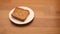 Slice of rye bread on plate kitchen table