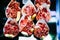 Slice spanish hamon in barcelona market, jamon iberico isolated, traditional national spain meat in store, serrano prosciutto food