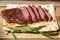 Slice steak on wooden board