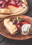 Slice of strawberry galette with ice-cream