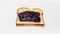 A Slice Of Toast With Grape Jelly Spread On Top. Generative AI