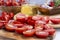 Slice a tomato, prepare tomatoes for drying