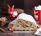 Slice traditional European cake Stollen with nuts and candied fruit