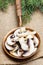 Sliced agaricus mushroom on frying pan