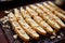 sliced almond-studded biscotti dough before second bake