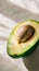 Sliced avocado on plain background