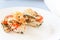 Sliced baked poultry fillet stuffed with soft cheese, tomatoes a