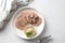 Sliced beef tongue delicacy on a white plate, beautiful classic serving with natural horseradish sauce