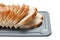 Sliced bread on breadboard isolated