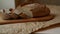 Sliced bread on cutting board at kitchen. Closeup of homemade bread slices