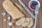 Sliced bread, pickled plum on the plate, pepper, knife