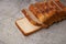 Sliced Bread stock image with wooden background.