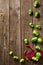 sliced brussels sprouts and peppers on slate wooden counter top background