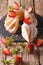 sliced bundt cake with strawberries fresh organic natural ingredients. Vertical